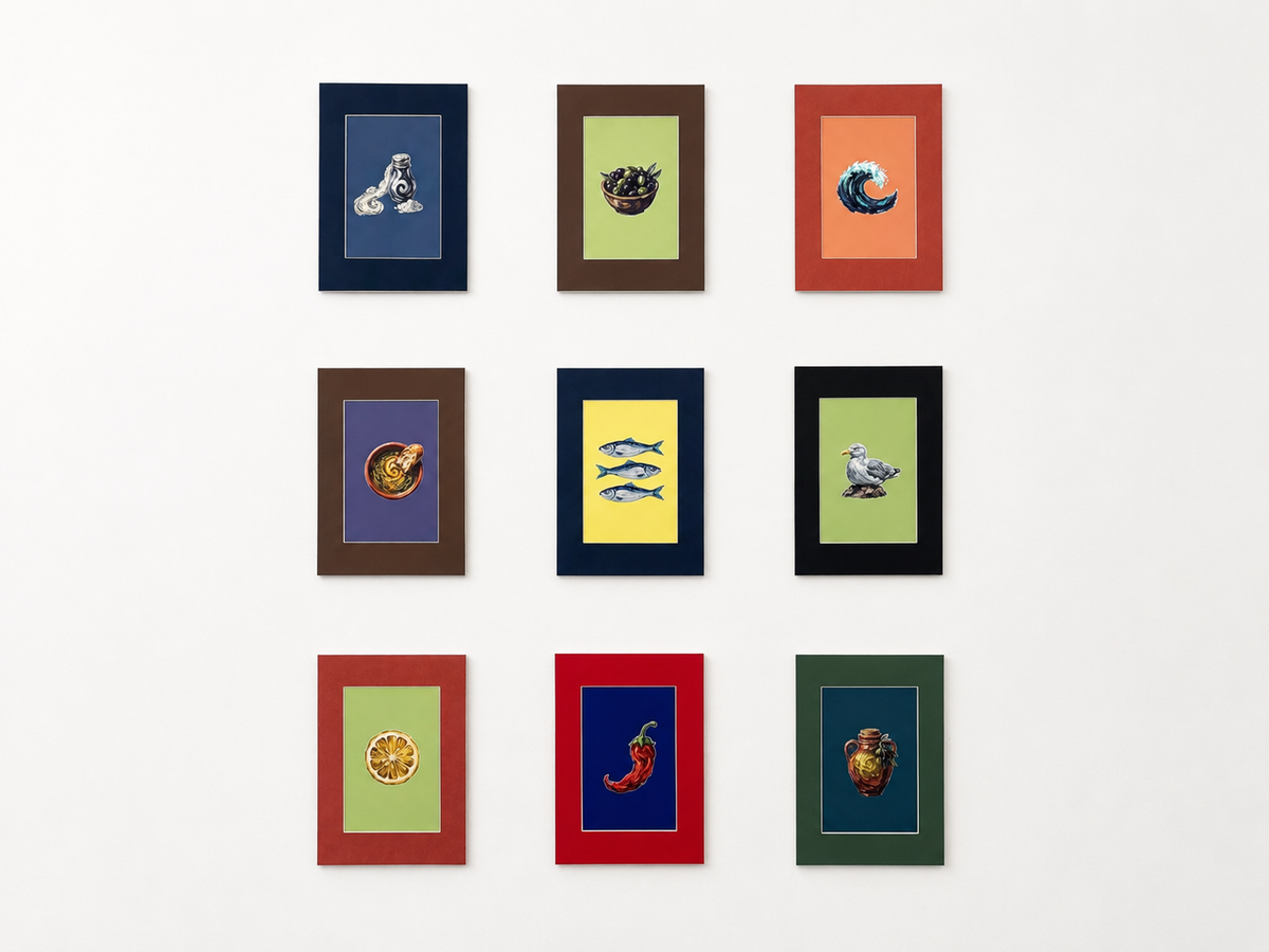 Mini art collection arranged as a gallery wall