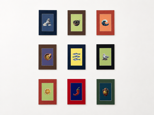Mini art collection arranged as a gallery wall