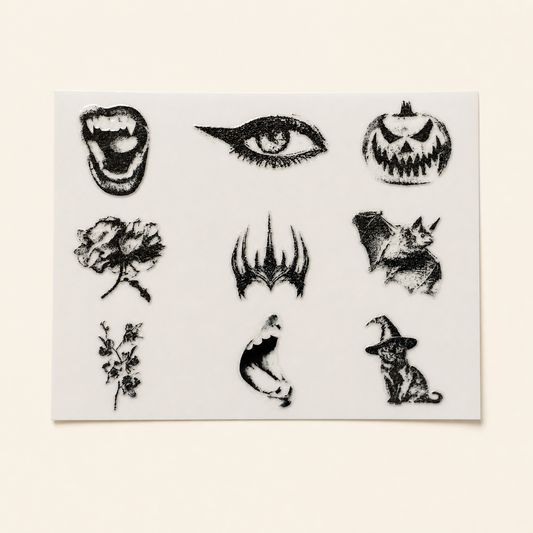 The Cabinet of Curiosities — Sheet 1: vampire mouth, eye, jack-o-lantern, rose, claws, bat, botanicals, mermaid, witch cat