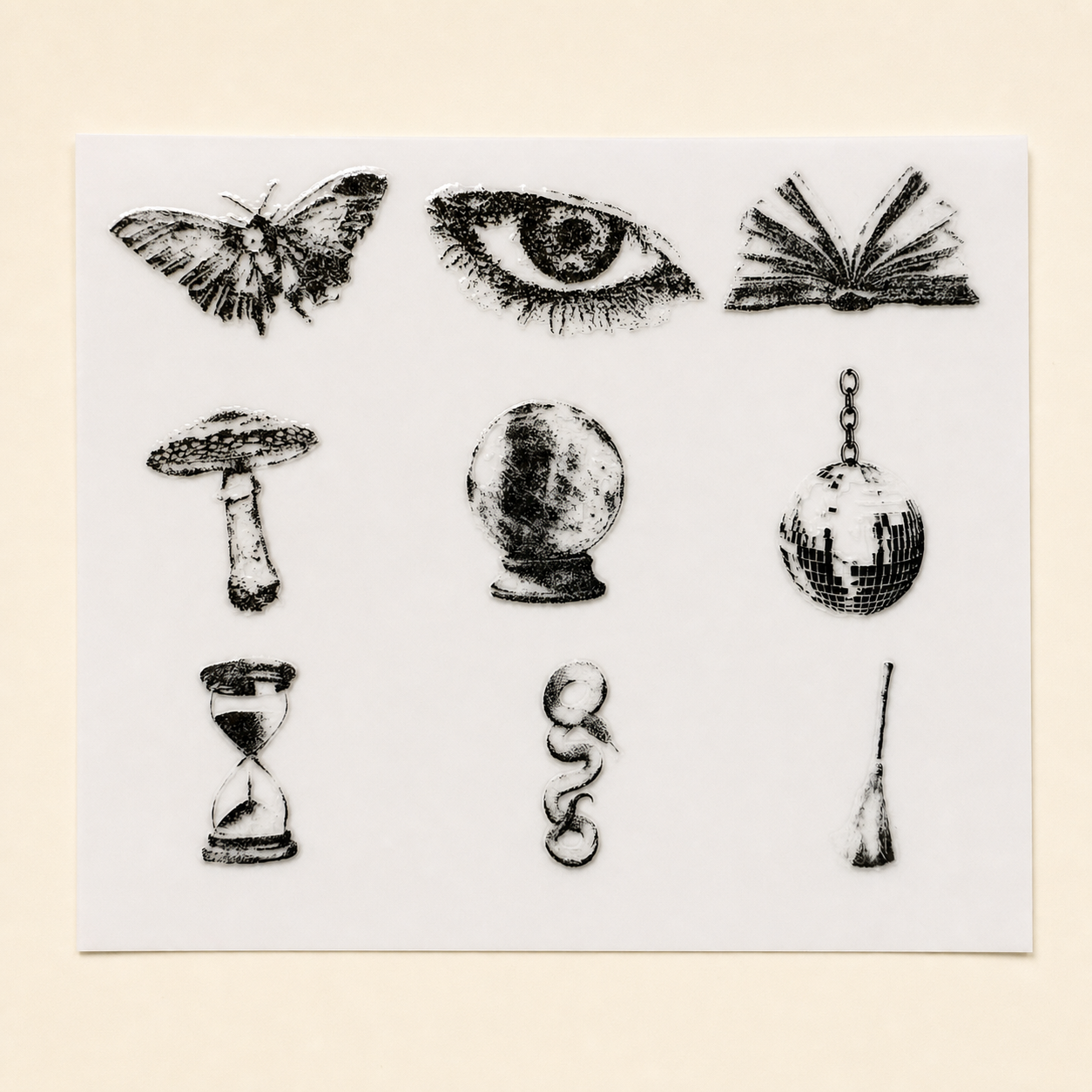 The Cabinet of Curiosities — Sheet 3: moth, eye, open book, mushroom, crystal ball, disco ball, hourglass, snake, broom